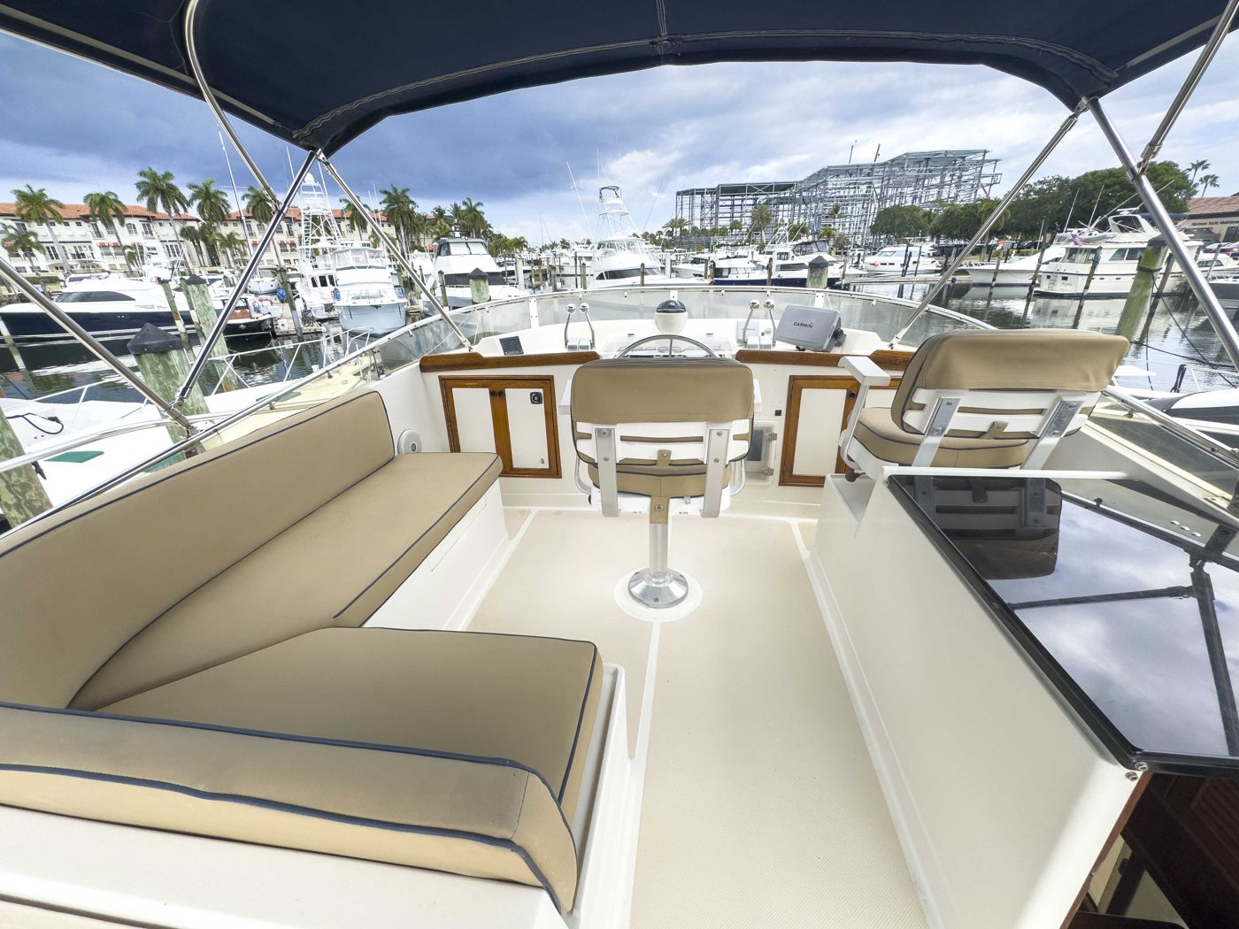 Island Girl cockpit with wet bar and swim platform access